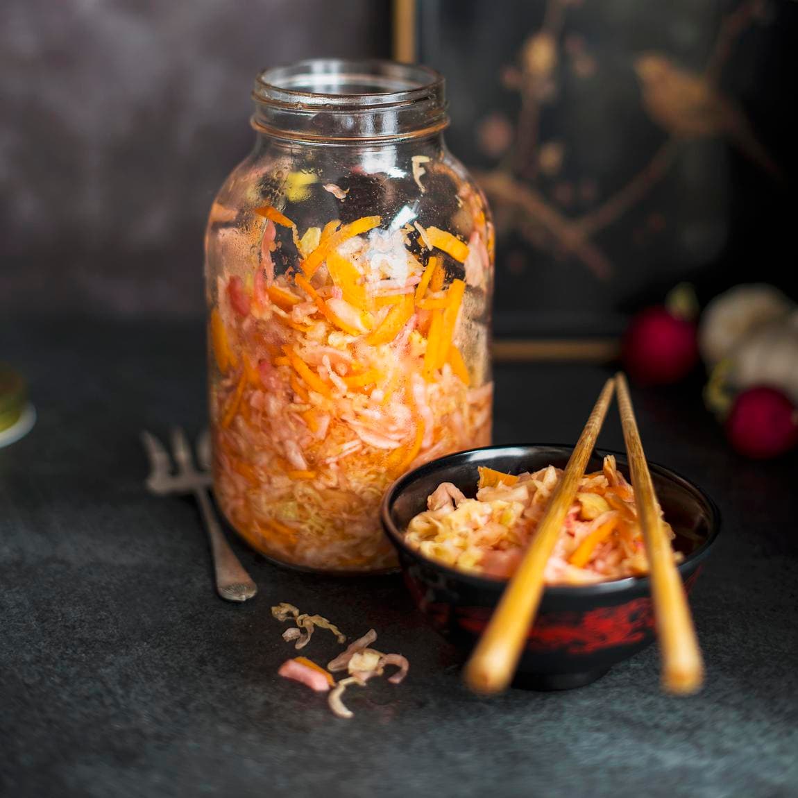 Cabbage kimchi in a jar and bowl