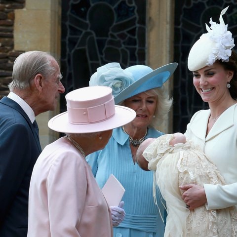 The Duke gazed at his great-granddaughter Princess Charlotte at her christening in 2015.